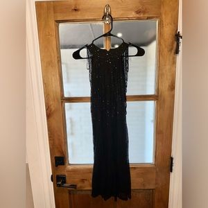 Small black cocktail dress with sequins and beads